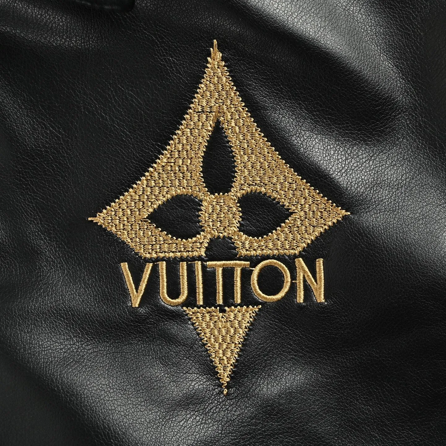 Louis Vuitton/Louis Vuitton black gold embroidered logo lapel leather jacket